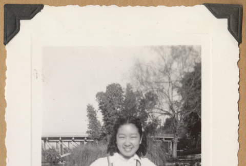 Girl in a boat (ddr-densho-542-211)