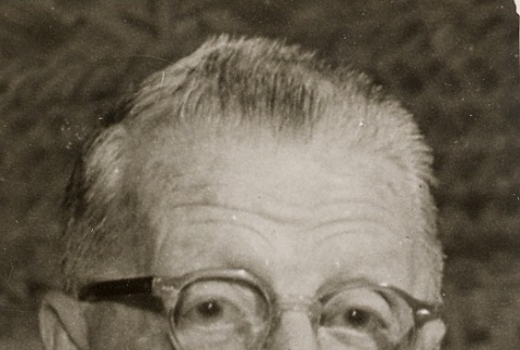 Ernest Shinkaku Hunt wearing leis (ddr-njpa-2-441)
