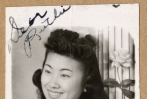 Portrait of a young woman with flowers (ddr-densho-542-252)