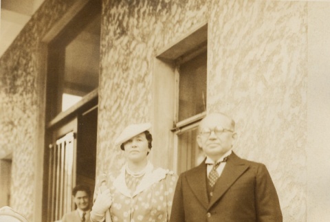 Konstantin Yurenev and a woman standing near a car (ddr-njpa-1-2639)