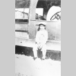 Boy in front of truck (ddr-densho-18-65)
