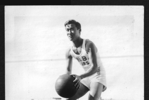 Tsutomu Inouye with basketball (ddr-ajah-6-477)