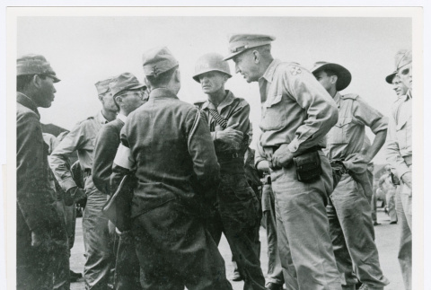 General Swing with Lt. General Eichelberger, Lt. Gen. Seizo Arisue and 1st Lt. Sadao Otake (ddr-densho-1007-273)
