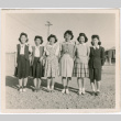 Six women standing outside of barracks (ddr-densho-458-63)
