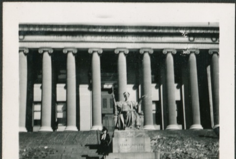 A woman in front of Columbia University Library (ddr-densho-298-223)