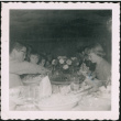 People sitting at a table eating (ddr-densho-523-285)