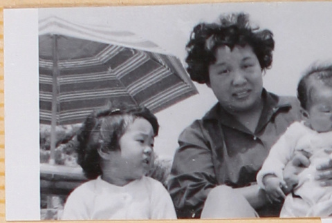Yoshiko, William, Susan and Leslie Shiomi on beach (ddr-densho-522-362)