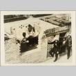 Air raid wardens and a family at a shelter (ddr-njpa-13-307)