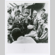 Max Desfor and other correspondents after Japanese surrender (ddr-densho-1007-96)