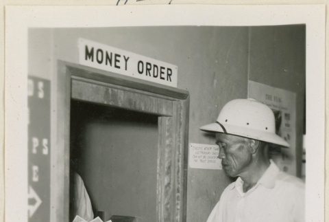 Eikichi Toshima buying war bonds (ddr-densho-37-891)