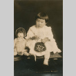 Portrait of young girl and doll (ddr-densho-348-85)