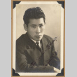 Portrait of a young man in a suit (ddr-densho-542-272)