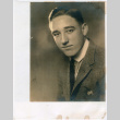 Two photos of young man (ddr-densho-408-2)