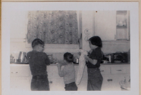 David, Peter, and Mary Alice doing dishes (ddr-densho-462-268)