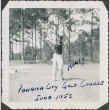 Man swings golf club (ddr-densho-321-388)