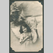 Photo of a young girl dressed as an angel (ddr-densho-483-160)
