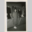 Woman at dressmaker's exhibit (ddr-densho-37-1222)