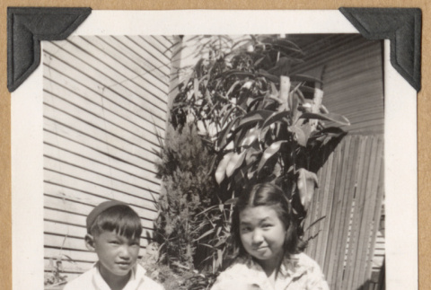 Boy and girl with a puppy (ddr-densho-542-197)