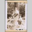 Two children on a tricycle (ddr-densho-483-1076)
