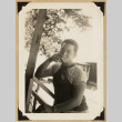 Roy Sumida smoking a cigarette (ddr-densho-542-556)