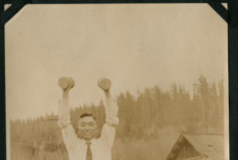 Man lifting weights (ddr-densho-359-515)
