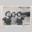 Three women at a Modernaires potluck party (ddr-manz-10-107)