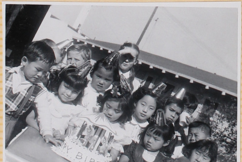 Group of children with birthday cake (ddr-densho-522-330)