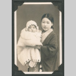 Photo of a woman in a kimono holding a baby (ddr-densho-483-265)