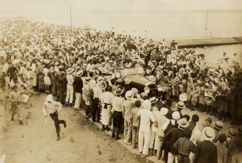 Charles and Anne Lindbergh driving through a crowd (ddr-njpa-1-1171)