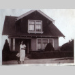 Woman and child in front of house (ddr-densho-1007-620)