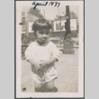 Toddler standing on city sidewalk (ddr-densho-483-685)