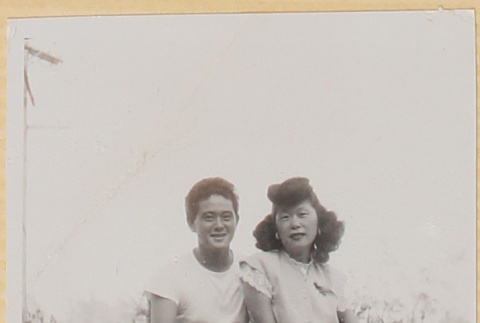 Couple sitting on lawn (ddr-densho-522-19)