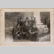 Six men posing in front of monument (ddr-densho-466-293)