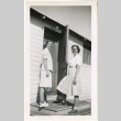 Two women on a doorstep (ddr-manz-7-129)