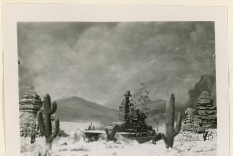 Model battle ship in a desert scene (ddr-densho-37-1241)