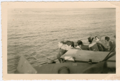Soldiers aboard ship looking out over water (ddr-densho-368-39)