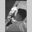 Man working with small hammer, possibly a jeweler (ddr-densho-426-2406)