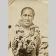 Duke Kahanamoku wearing leis (ddr-njpa-2-499)