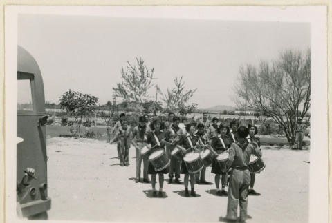 Boy and Girl Scouts drum and bugle corps (ddr-densho-37-1431)