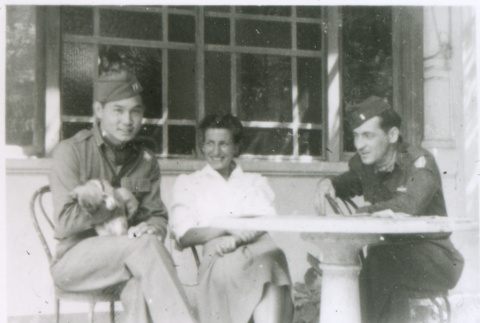 3 at table with pet (ddr-densho-1007-753)