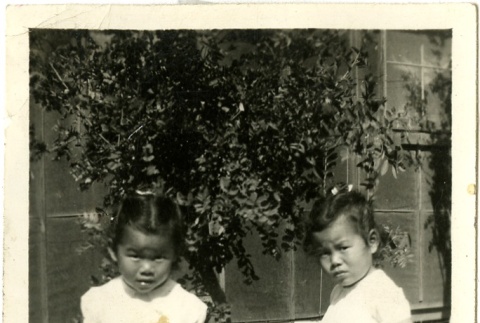 Two sisters in front of barracks (ddr-manz-6-58)