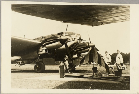 Men fueling a plane (ddr-njpa-13-860)