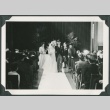 Newly married couple walking down the aisle (ddr-densho-300-233)