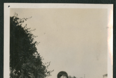 girl in garden (ddr-densho-378-457)