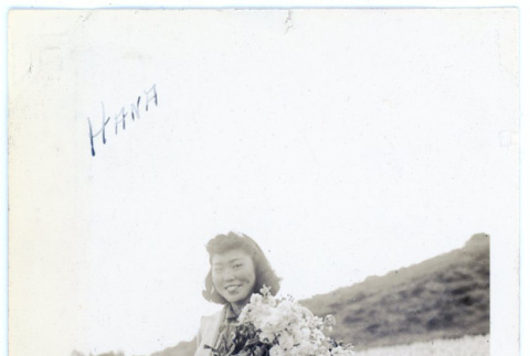 Woman holding flowers (ddr-densho-373-12)