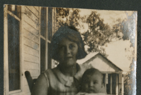 woman and baby in rocking chair (ddr-densho-378-701)