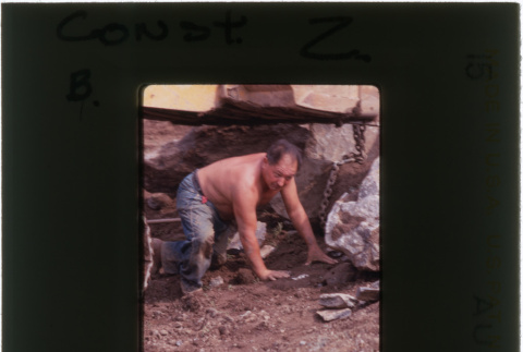 A man working on rock garden construction (ddr-densho-377-909)
