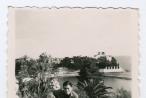 Soldier standing above waterfront (ddr-densho-368-165)