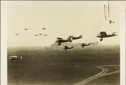 French planes flying over an airfield (ddr-njpa-13-1338)
