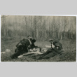 Photo of three men on a picnic (ddr-densho-355-11)